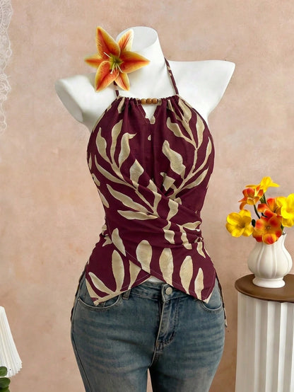 GlowEve CURVE Plus Size Women's Spring/Summer Elegant Commuter Casual Apricot Leaf Print Sleeveless Halter Neck Bow Tie Neckline Wooden Bead Decor Asymmetric Hem Waist Cross Tie Design Fitted Slimming