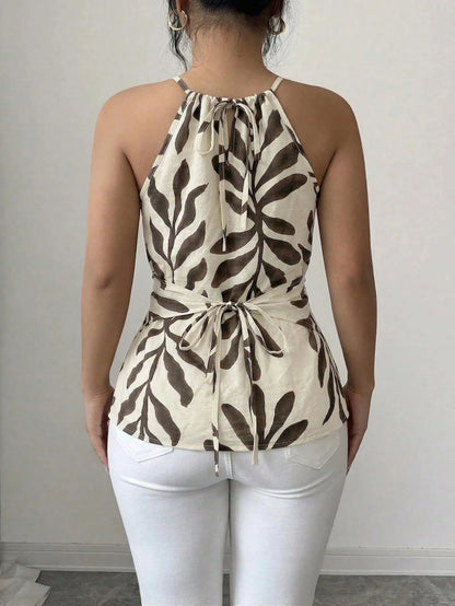 GlowEve CURVE Plus Size Women's Spring/Summer Elegant Commuter Casual Apricot Leaf Print Sleeveless Halter Neck Bow Tie Neckline Wooden Bead Decor Asymmetric Hem Waist Cross Tie Design Fitted Slimming