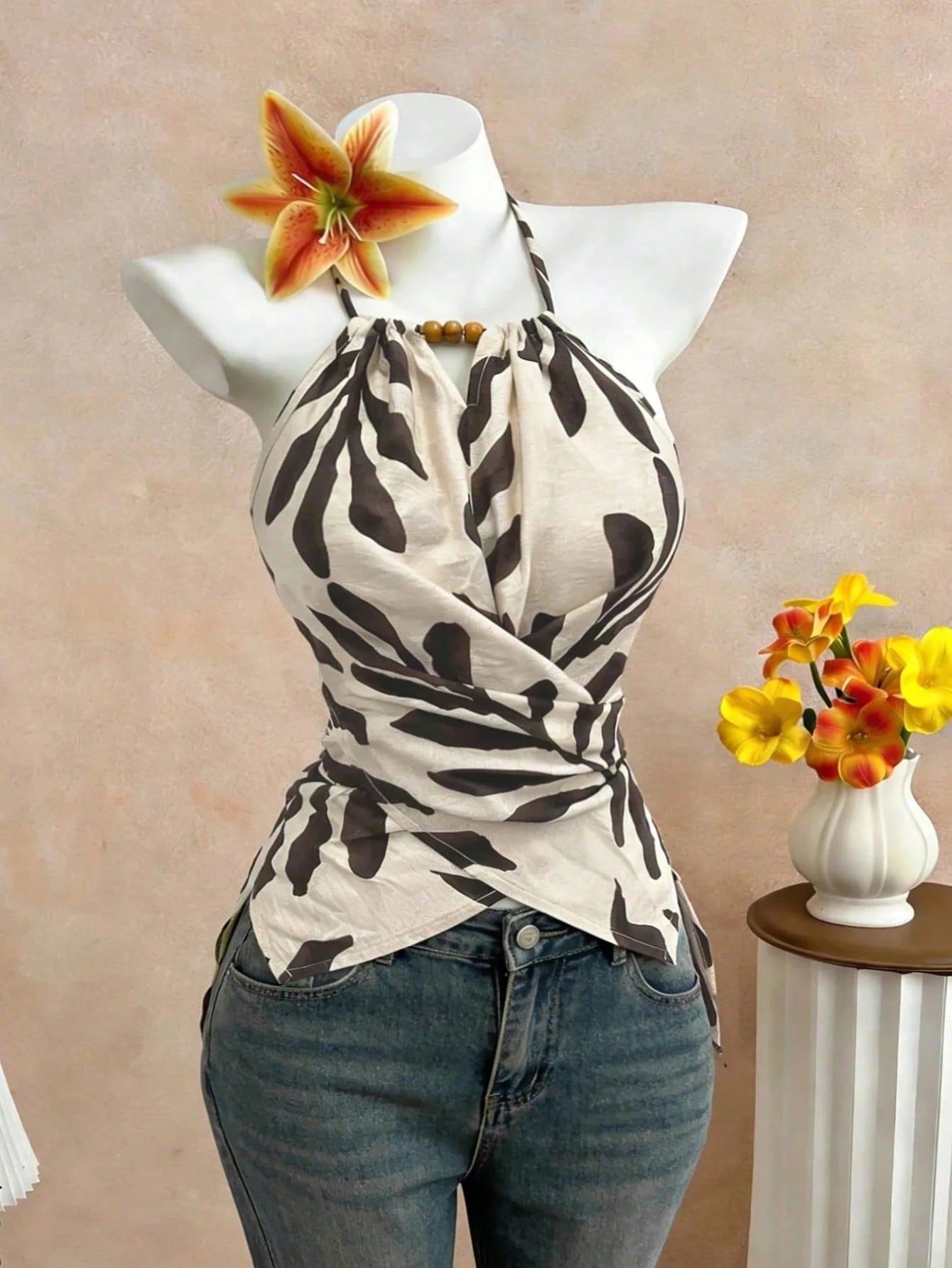 GlowEve CURVE Plus Size Women's Spring/Summer Elegant Commuter Casual Apricot Leaf Print Sleeveless Halter Neck Bow Tie Neckline Wooden Bead Decor Asymmetric Hem Waist Cross Tie Design Fitted Slimming