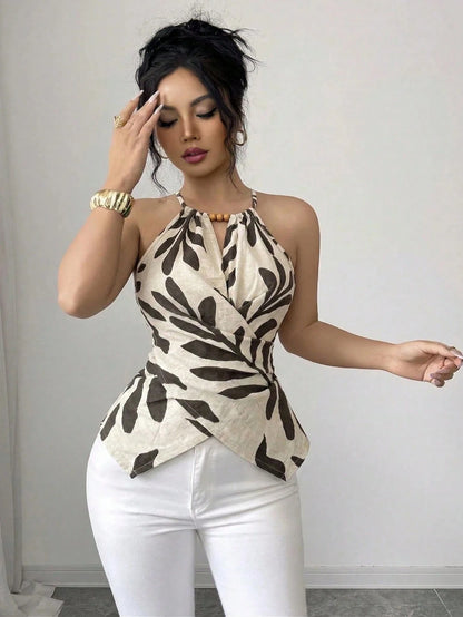 GlowEve CURVE Plus Size Women's Spring/Summer Elegant Commuter Casual Apricot Leaf Print Sleeveless Halter Neck Bow Tie Neckline Wooden Bead Decor Asymmetric Hem Waist Cross Tie Design Fitted Slimming