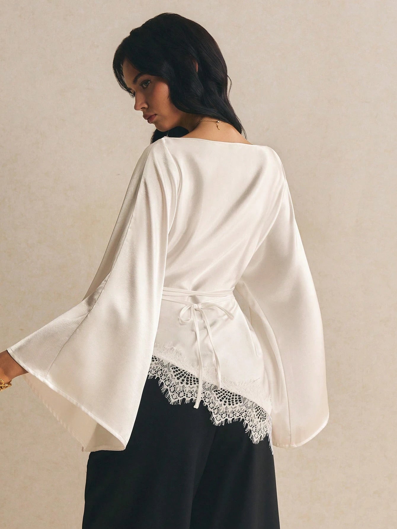 Poéselle Women's Elegant Commuter Date Night Solid Color Bell Sleeve Lace Patchwork Asymmetric Hem Blouse Cream White Autumn