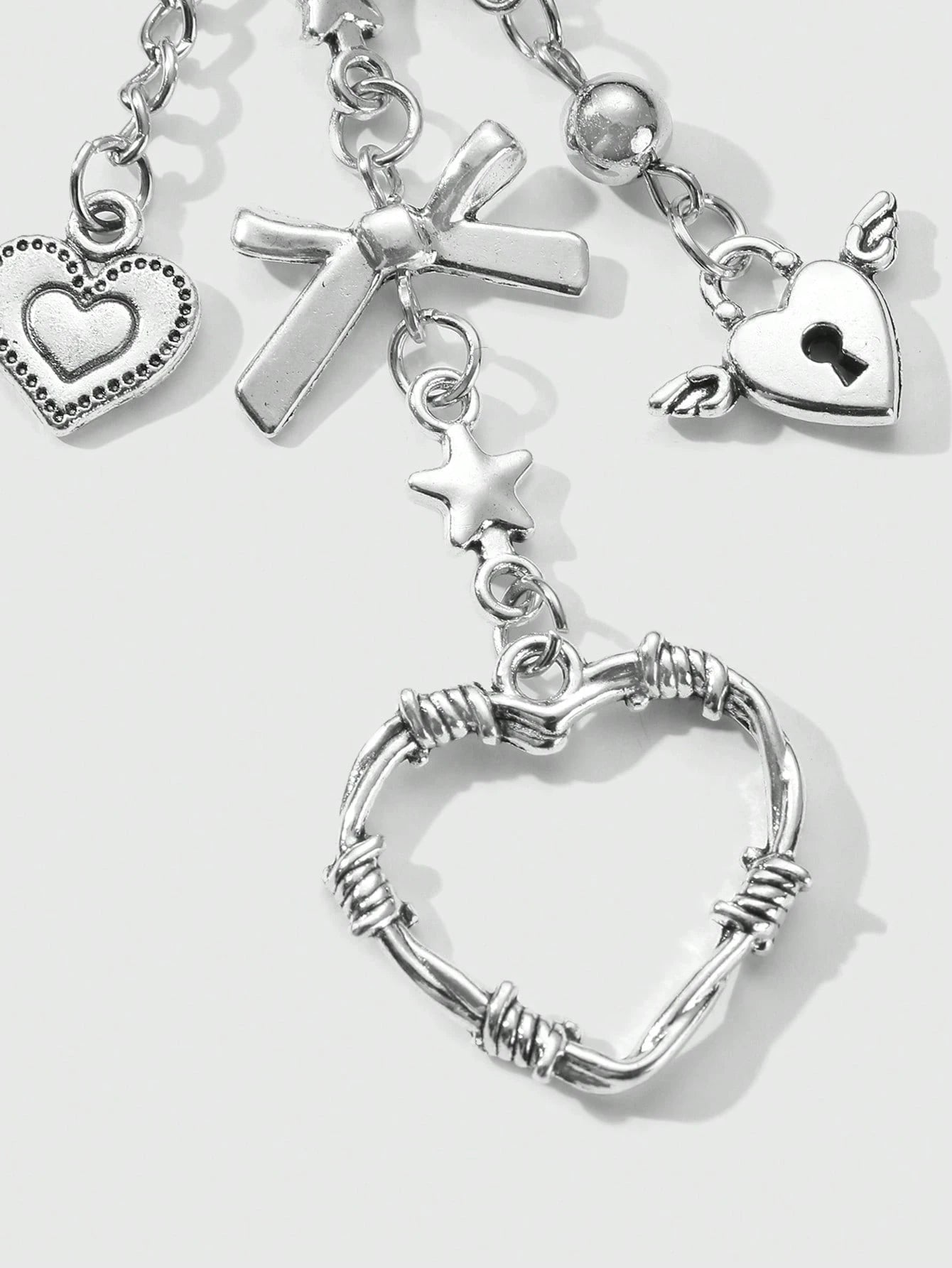 ROMWE Kawaii 2pcs Y2K Chic & Stylish Silver Star Chain Hollow Thorn Heart Crystal Bow Butterfly Wings Teddy Bear Lock Key Chain Bag Charm Combo Set, Suitable For Sisters, Girlfriends, Couples, Friends