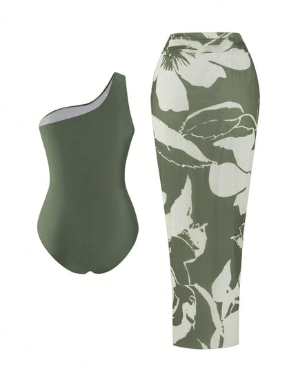 Swim Oasis 2026 Plus Size Women 2-Piece Green One Shoulder Ruched Mesh Patchwork One-Piece Swimsuit With Matching Print Skirt Set Beach Summer Elegant Sexy