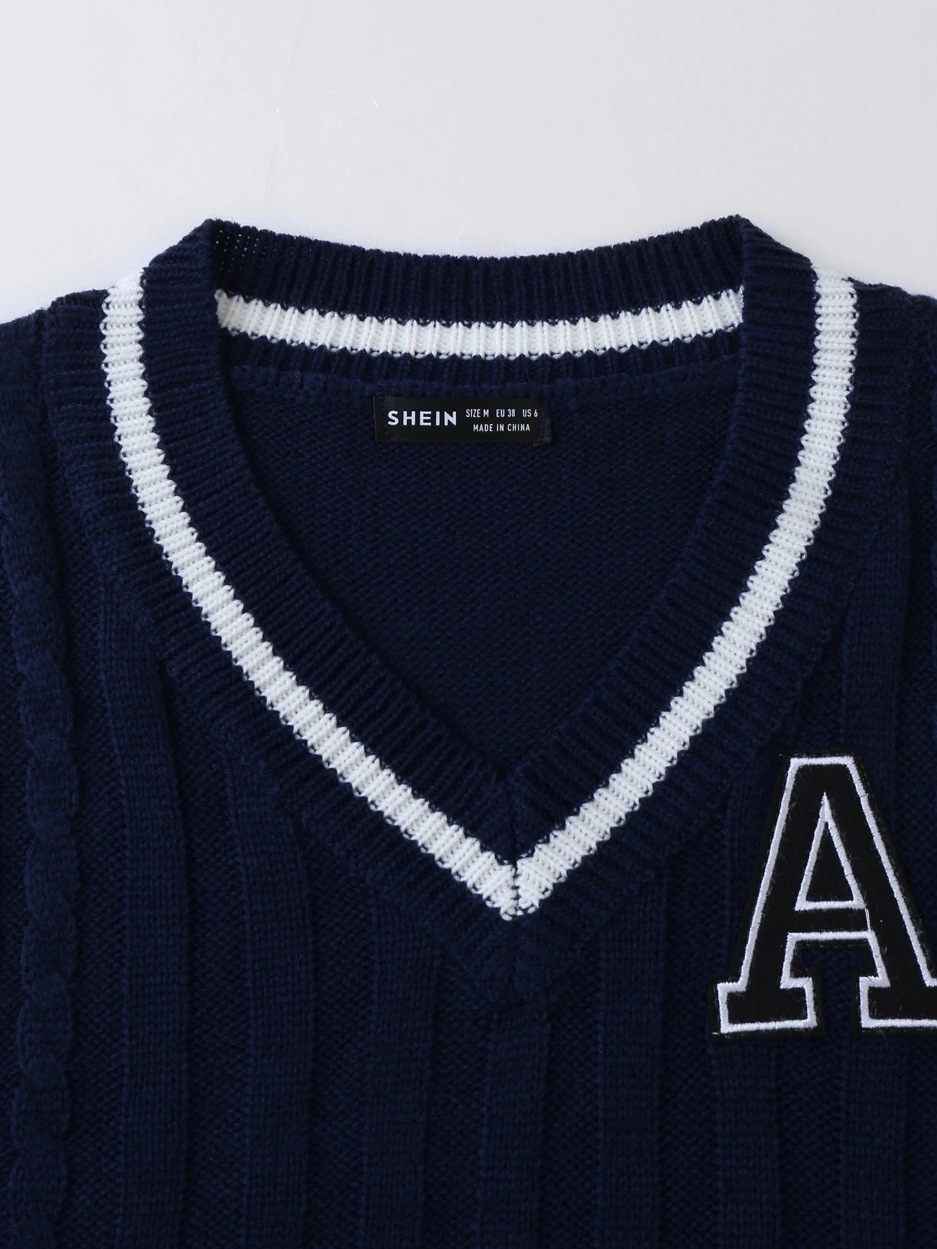 Unity 1pc Letter Patched Detail Striped Trim V-neck Sweater Vest